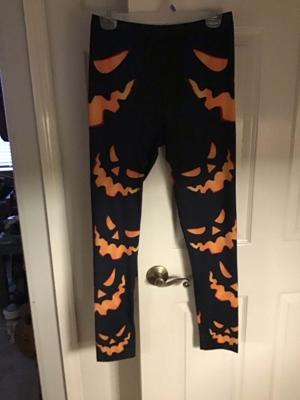 Ladies Large No Boundaries Black Leggings with Orange Jack-O'-Lantern Faces